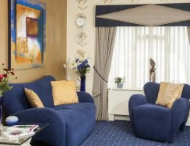 Blue sofas in Bury St Edmunds care home, North Court - Maven Healthcare