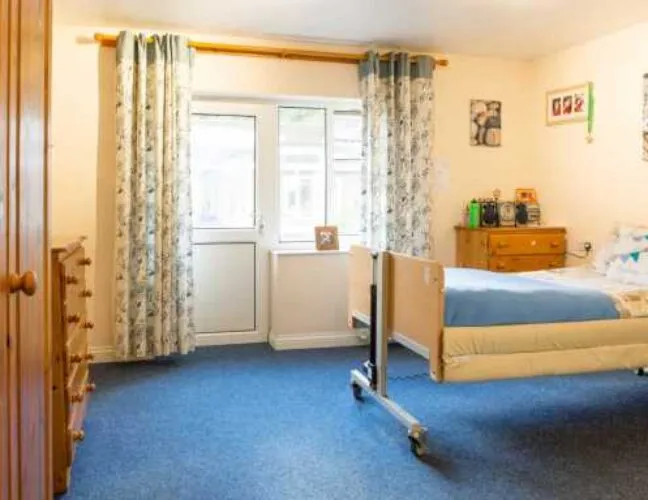 A bedroom at Ashmill, Birmingham care home - Maven Healthcare