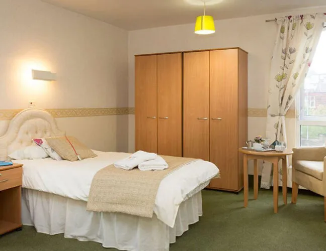 A bedroom at Clarence Court care home in Glasgow - Maven Healthcare