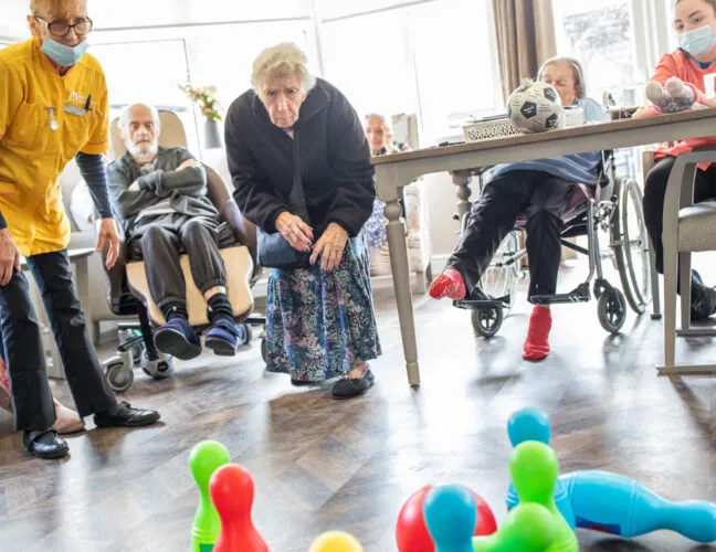 Residents play bowling at Midfield Lodge care home in Cambridge - Maven Healthcare